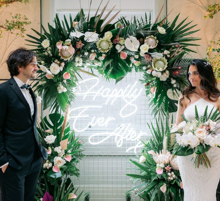 Happily ever after neon sign for tropical themed wedding