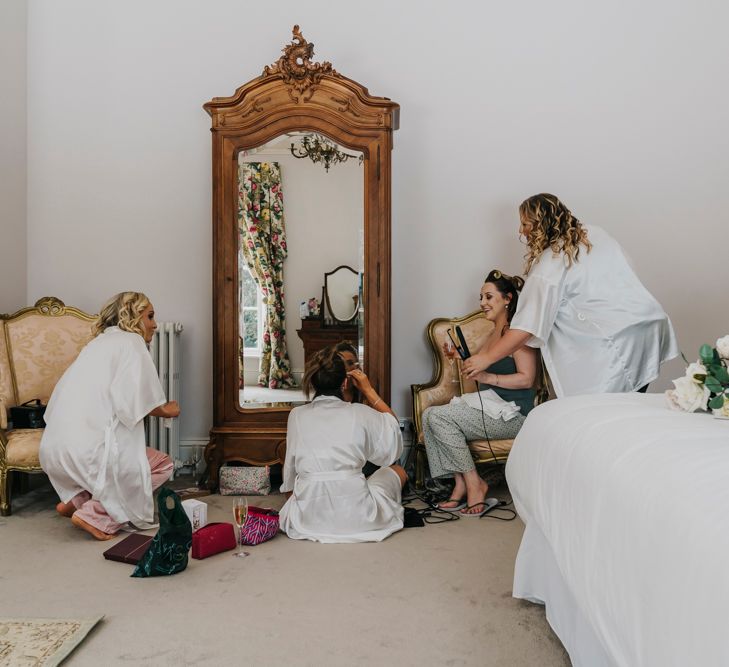 Bridesmaids getting ready on the wedding morning 