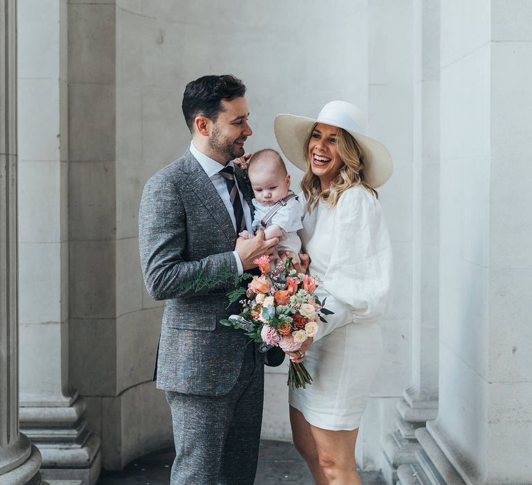 Bride and groom photography for London wedding bride wearing short Net A Porter Wedding dress 