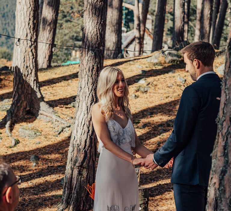 Bride & groom in Scotland handfasting ceremony 