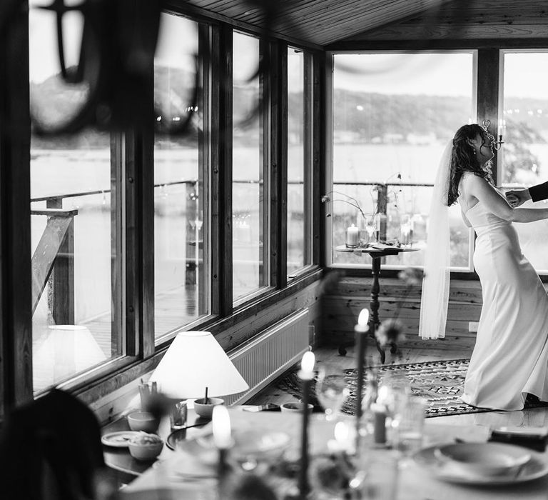 The bride and groom dancing at their micro destination wedding in Sweden