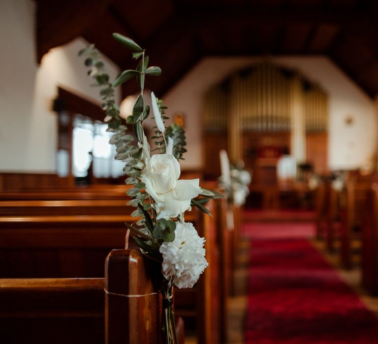 Roses, carnations and eucalyptus flowers for minimal wedding flower decor