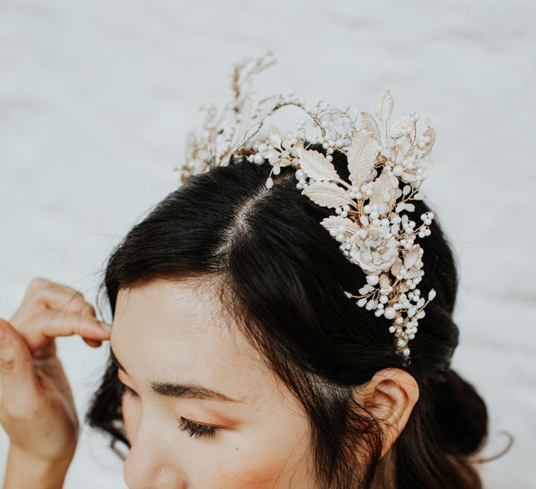 The bride wore a intricate floral head piece from Clare Lloyd Accessories