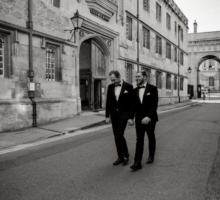 Grooms walk through Oxford in black & white image