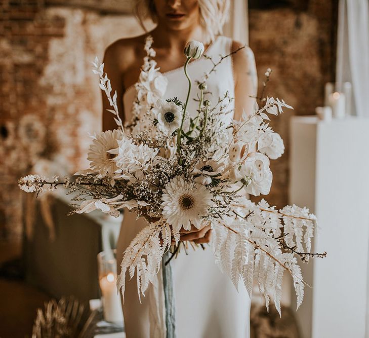 White wedding bouquet with gerberas, anemones and poppies 