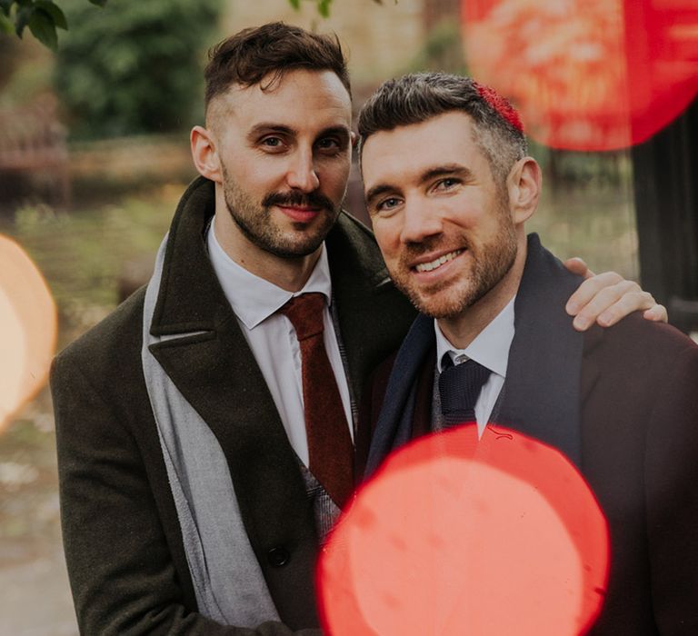 Grooms pose for pre-wedding photos on their wedding day in London