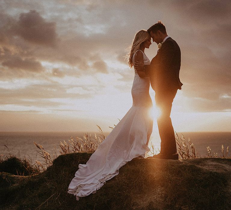 Golden hour wedding portrait by Isle of Wight wedding photographer