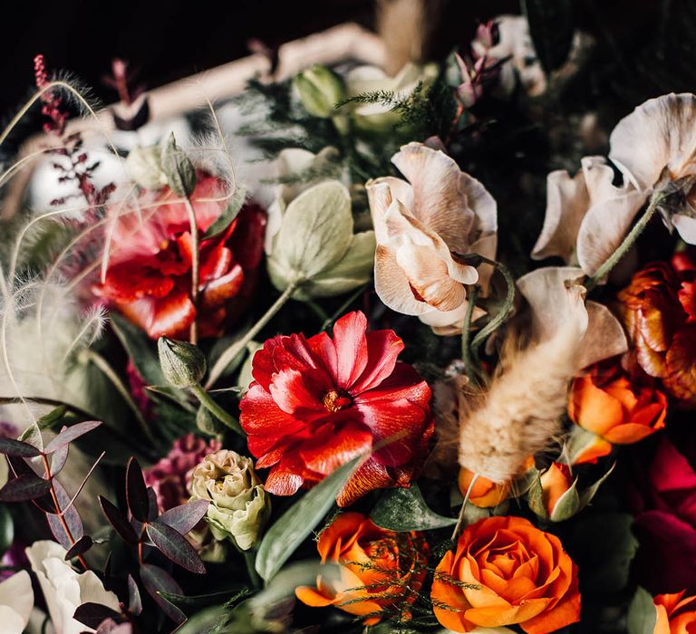 Orange and red autumnal wedding flowers 