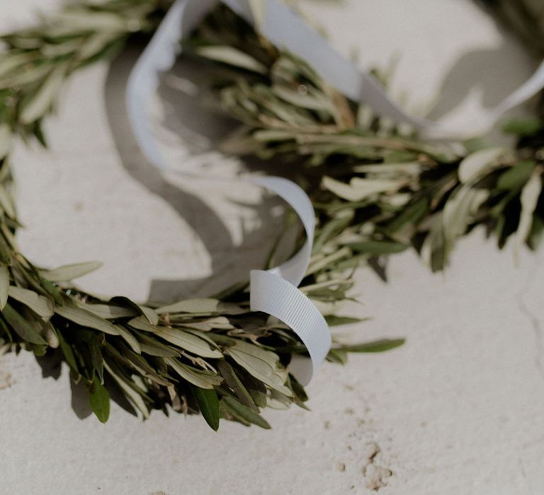 Olive leaf floral crowns for Stefana crowning tradition in wedding ceremony