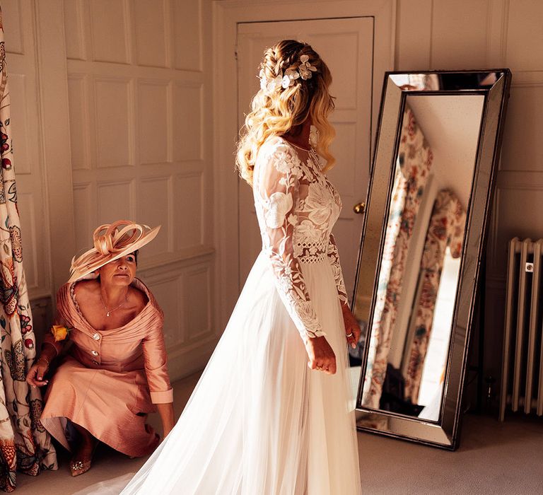 Bride in lace long sleeve Margaux Tardits getting ready for the wedding day 