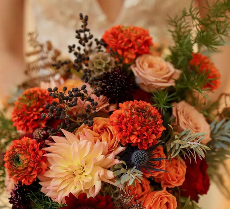 Cafe au lait seasonal autumn wedding flowers in an warm tone burnt orange wedding bouquet 