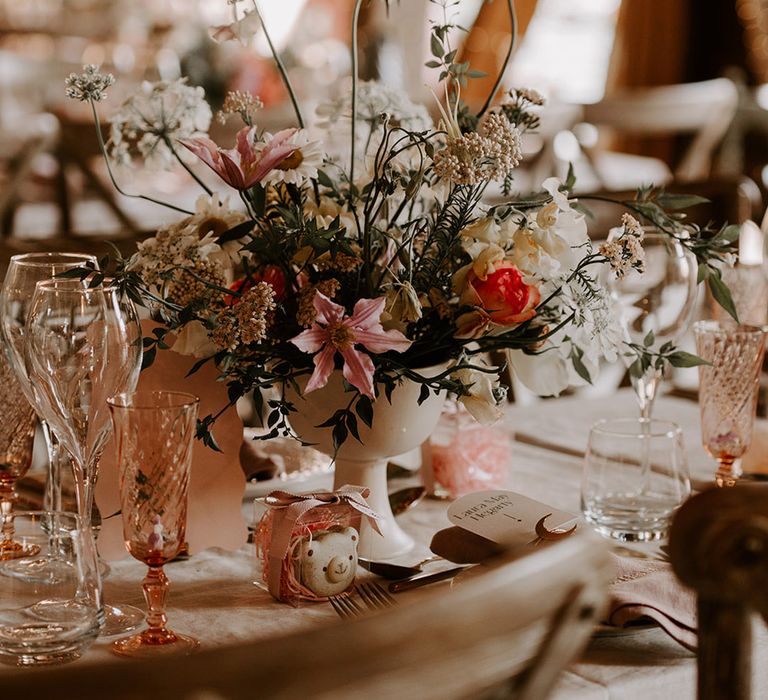 Pink, white and lilac wedding table flower centrepiece 