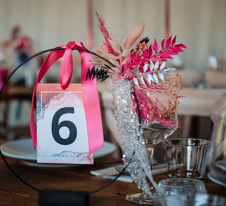 DIY hot pink and black wedding table centrepiece 