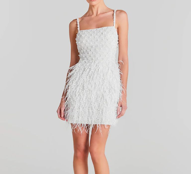 Mini embellished Nadine Merabi wedding dress with pearls and feathers 