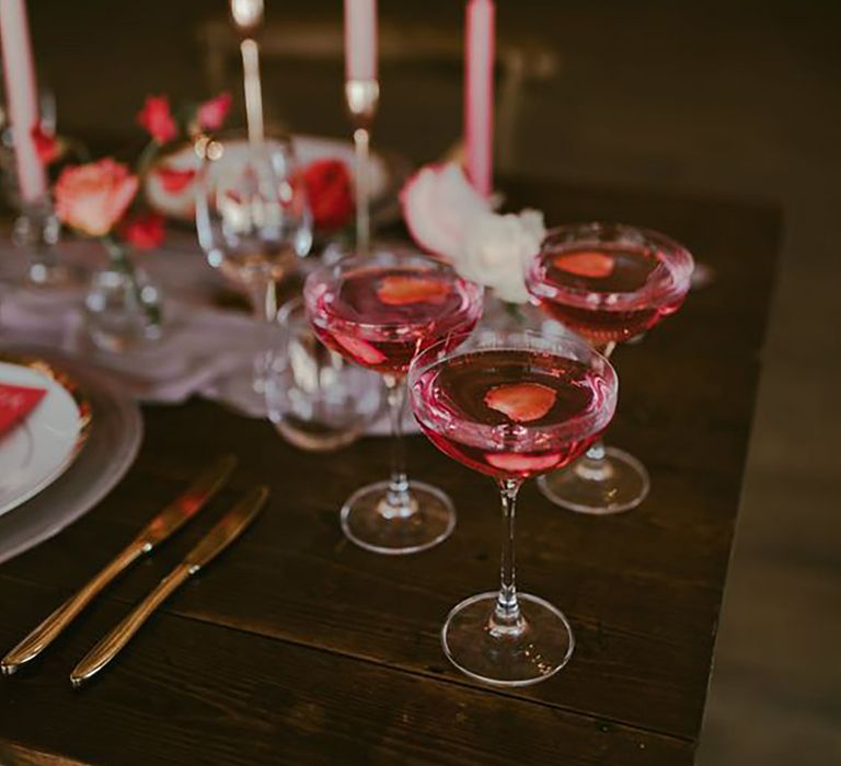 Image of pink strawberry flavoured cocktails for weddings or hen dos on a table