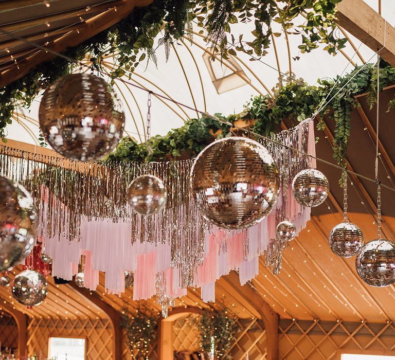 Thorpe Grdens weding venue in Staffordshire decorated with pink streamers and disco balls 