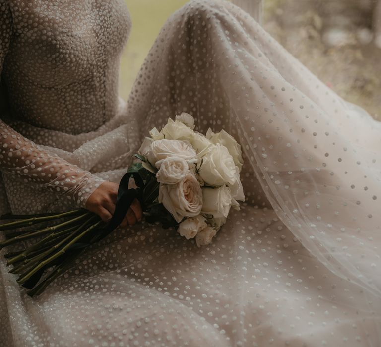 romantic all white rose wedding bouquet 