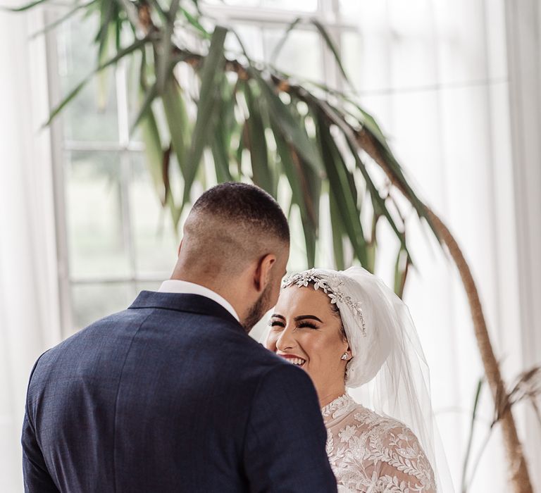 Bride and groom first look at Islamic wedding