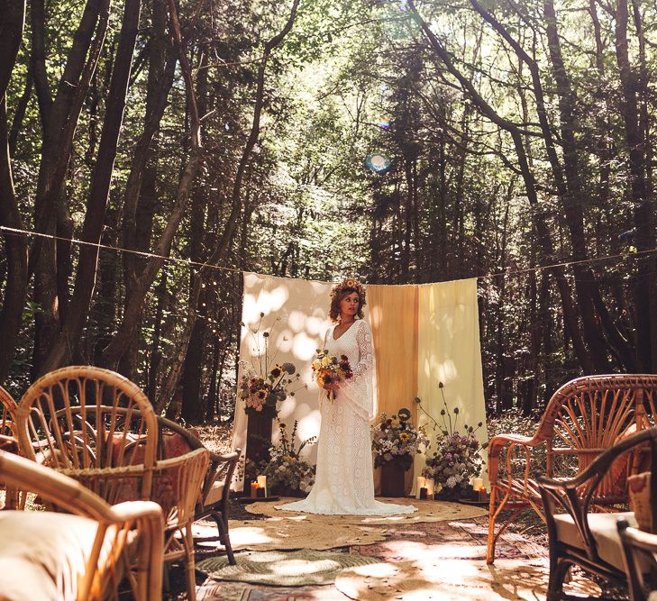 Bride in Longton Wood with wicker chairs 