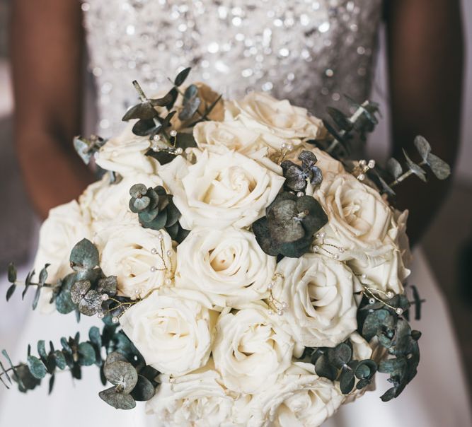 DIY white rose wedding bouquet with eucalyptus 