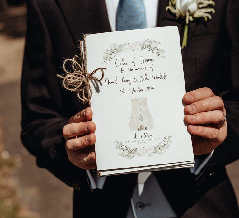 Country wedding order of service booklet with brown string photographed by Foto Memories