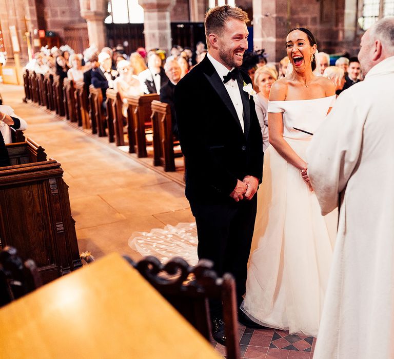 Bride and groom during church wedding ceremony