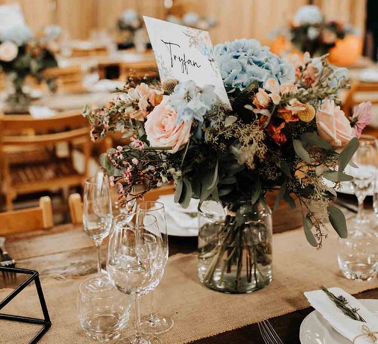 Pastel flower wedding table centrepieces