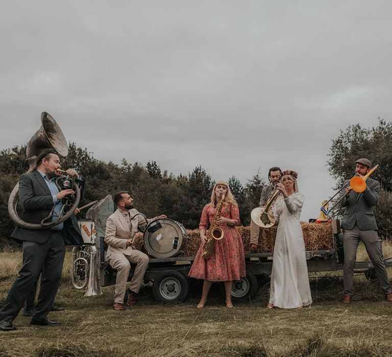 Bride joins in playing music at wedding