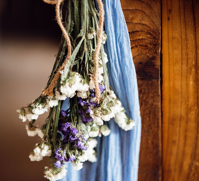 Pale blue wedding decor for the wedding bar with dried flowers 