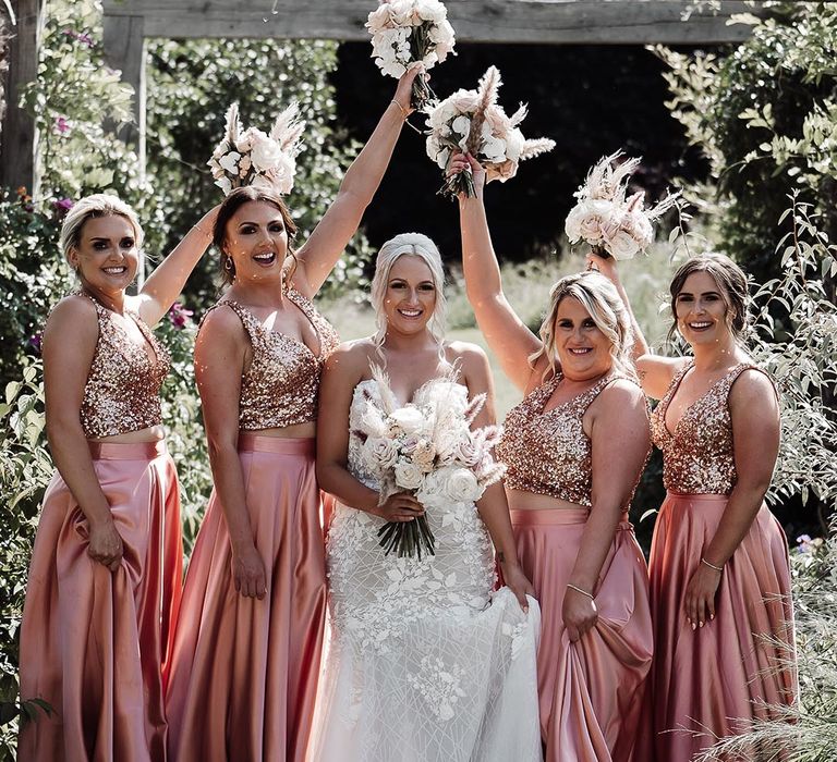 Bridesmaids in sparkly embellished pink bridesmaid dresses with sequins 