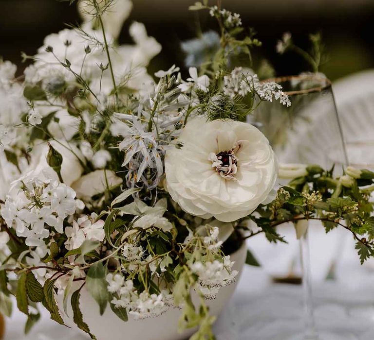 white wedding flower table decorations at Capesthorne Hall wedding