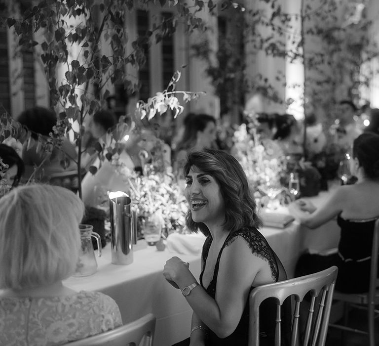 Wedding guests sit down for their wedding breakfast at Signet Library 