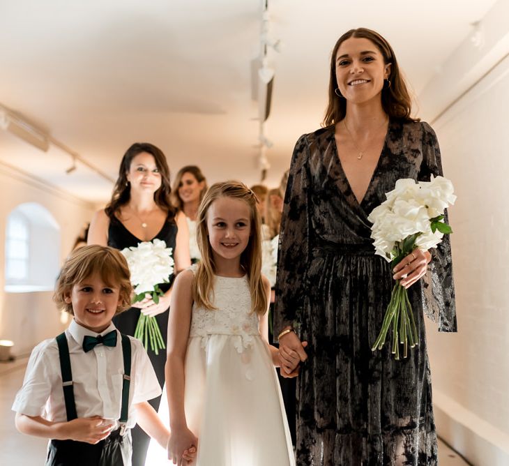 Bridesmaids make their way to the wedding in London