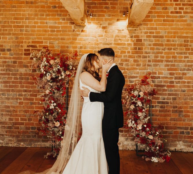 Bride and Groom Kissing at the Stunning Brickhouse Vineyard