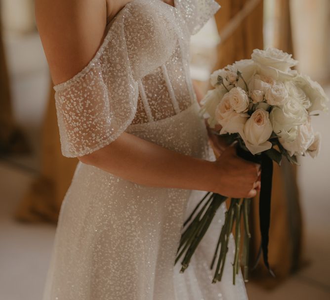 Off the shoulder sparkly wedding dress