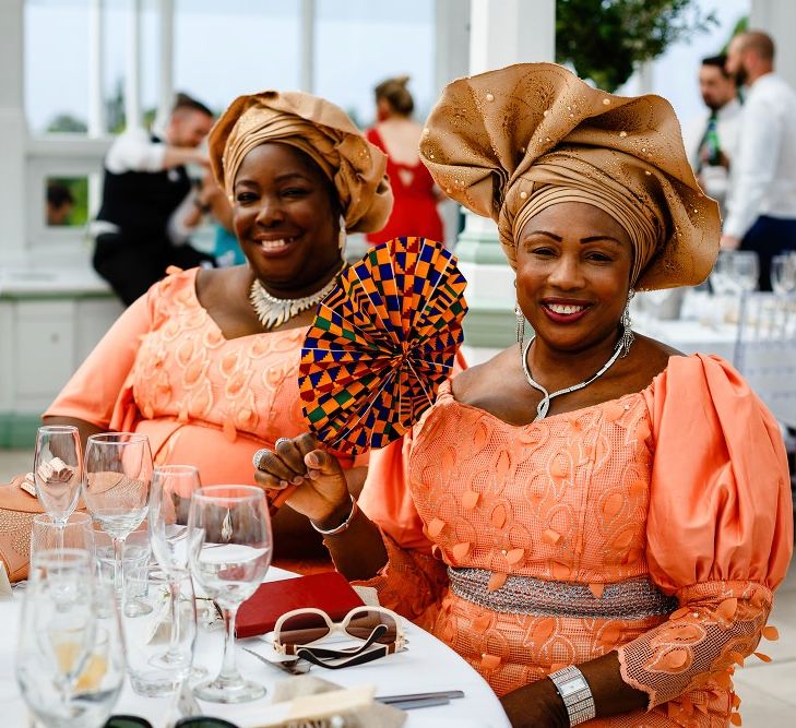 Wedding guests in traditional Nigerian outfits 