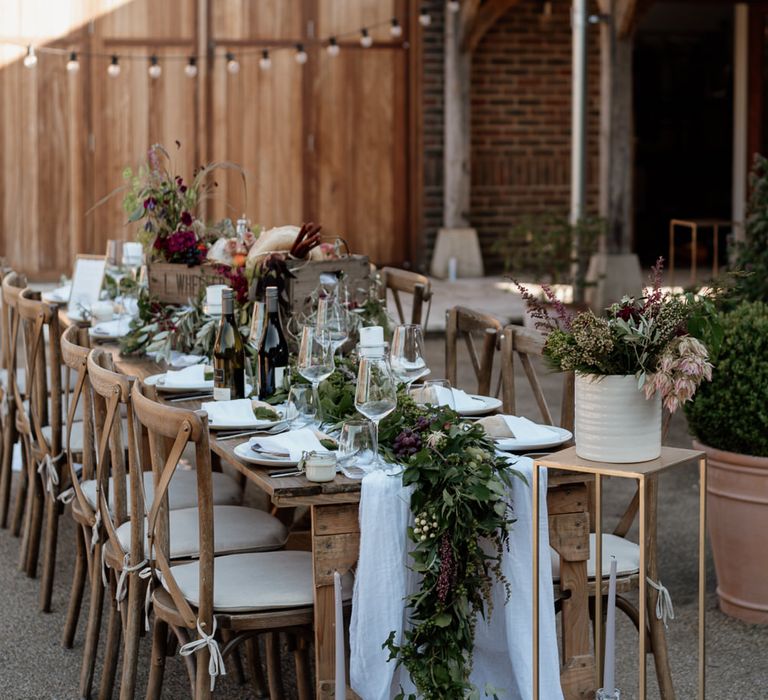 Graze tables with antipasti feast and festoon lights 