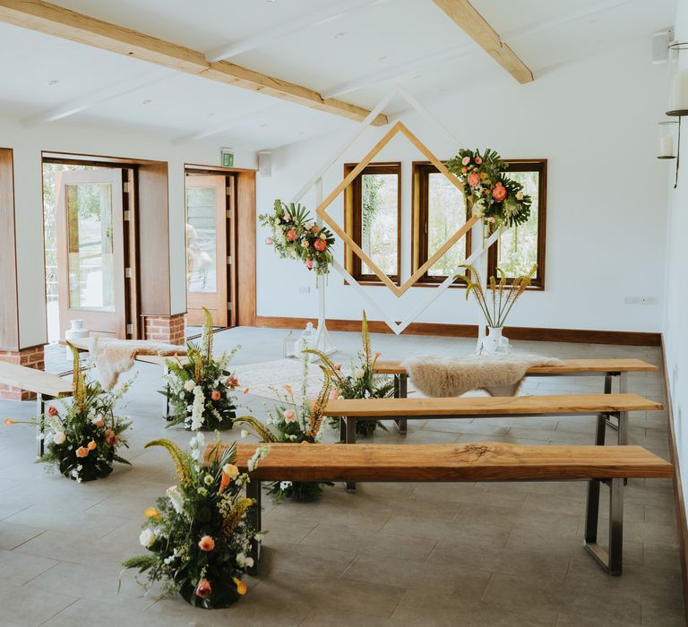 The Byre interior with green foliage decoration