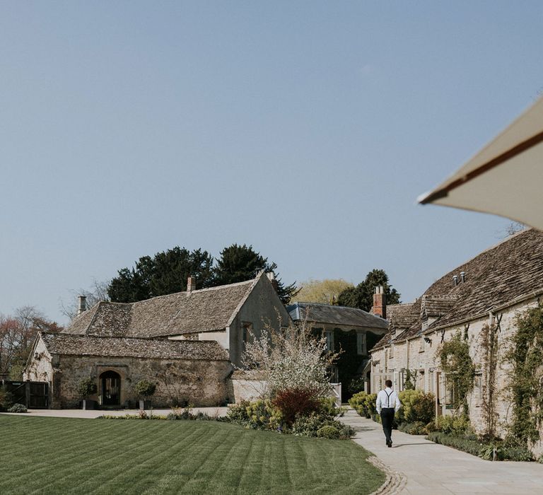 Sunny grounds at Caswell House for summer wedding