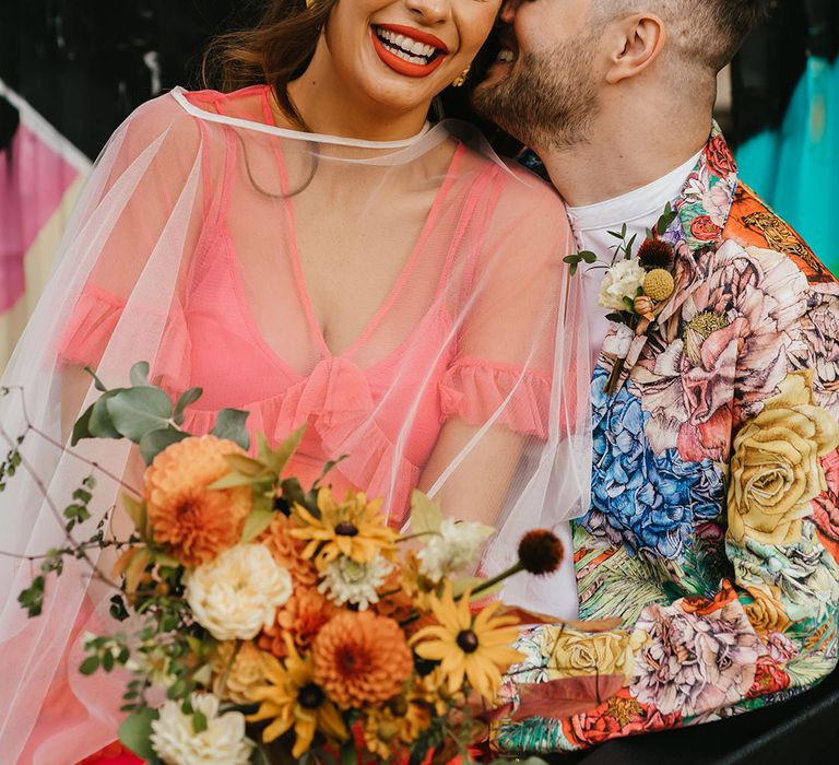 Intimate couples portrait at colourful Shoreditch elopement with interabled couple