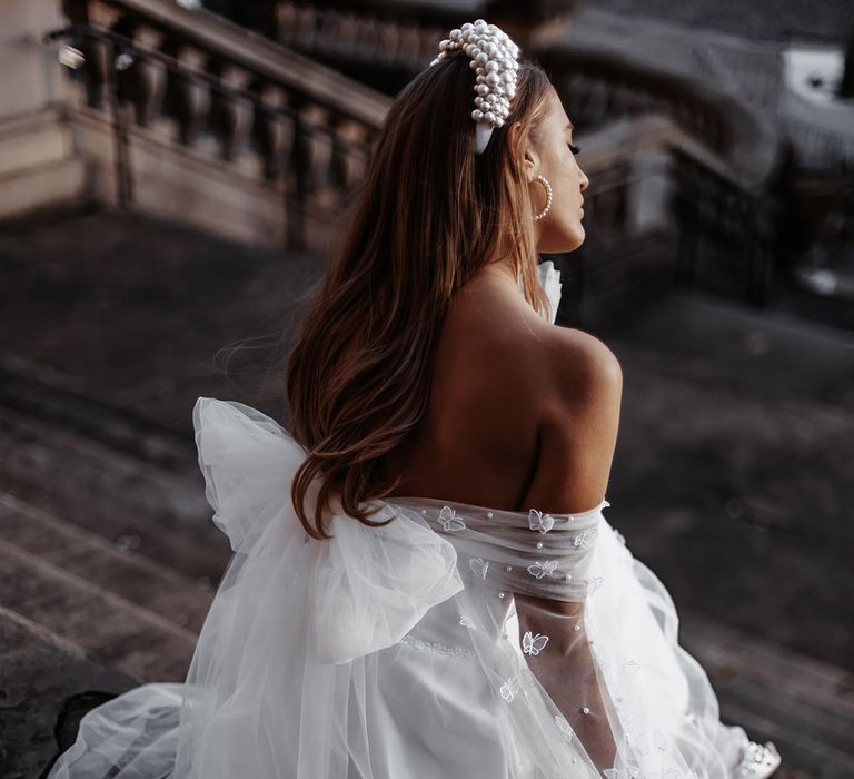 Daniel Chu wedding dress with tulle bow back design 