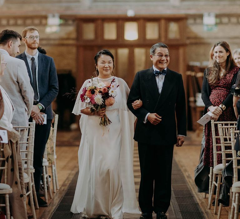 Bride walks down the aisle with her father  | Irene Yap Photography