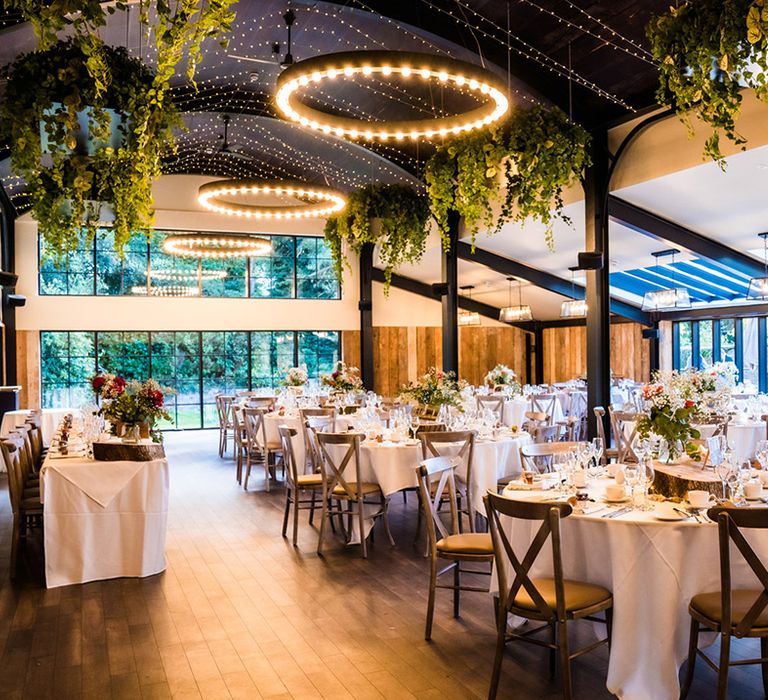 Wedding reception area at Foxtail Barns wedding venue with circle lights 