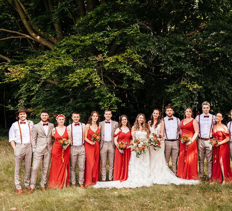 Entire wedding party pose together for a wedding at The Dreys