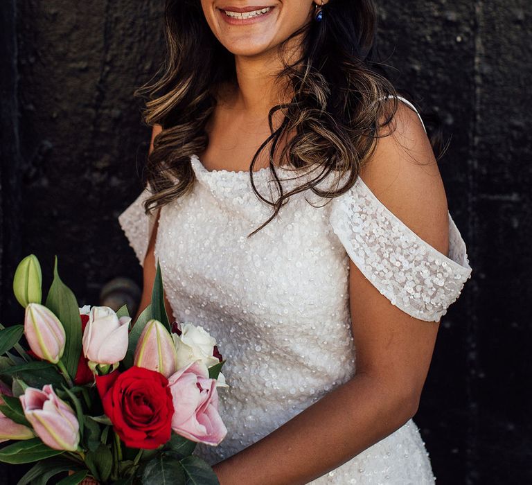 Indian bride wears off-the-shoulder sequin embellished wedding dress 