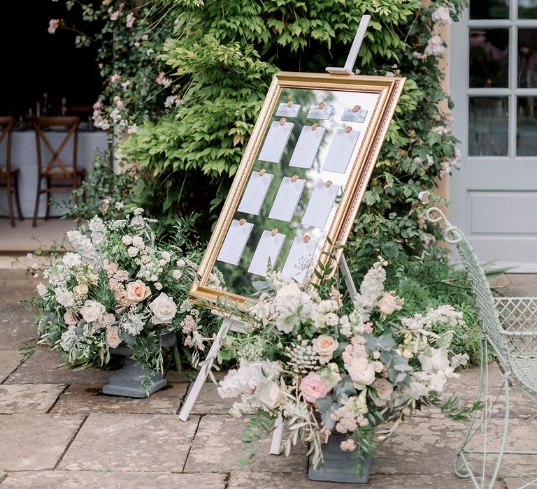 elegant mirror wedding table plan at Italian themed wedding 