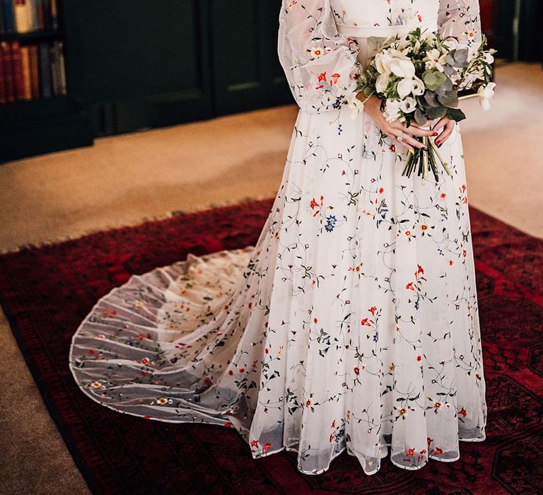 Crypt On The Green wedding venue in London with bride in floral embroidery dress 