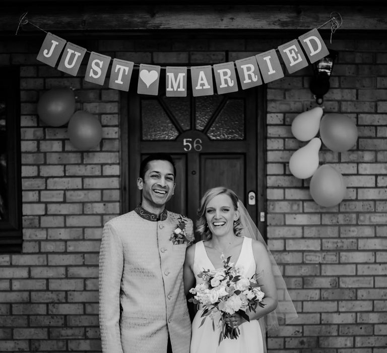 Bride and groom portrait by Joasis Photography