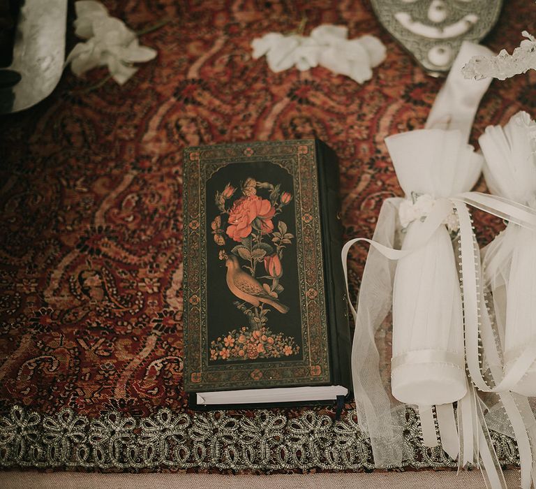 Bottles wrapped in fabric for religious wedding ceremony 