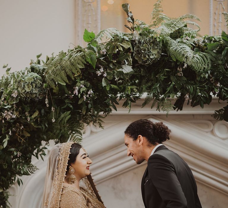 Bride and groom exchanging vow at Nikah ceremony 